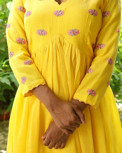 Hand embroidered yellow chanderi dress